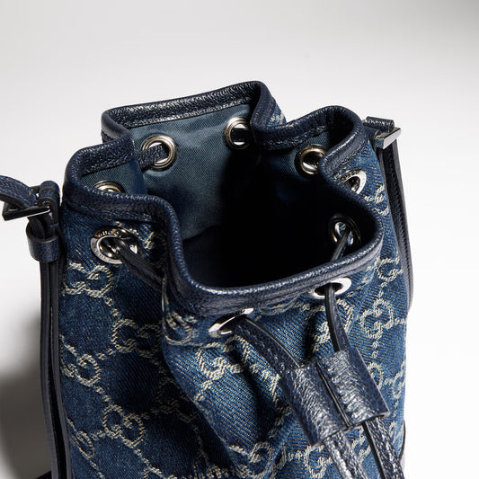 Mini bucket bag with Gucci plaque