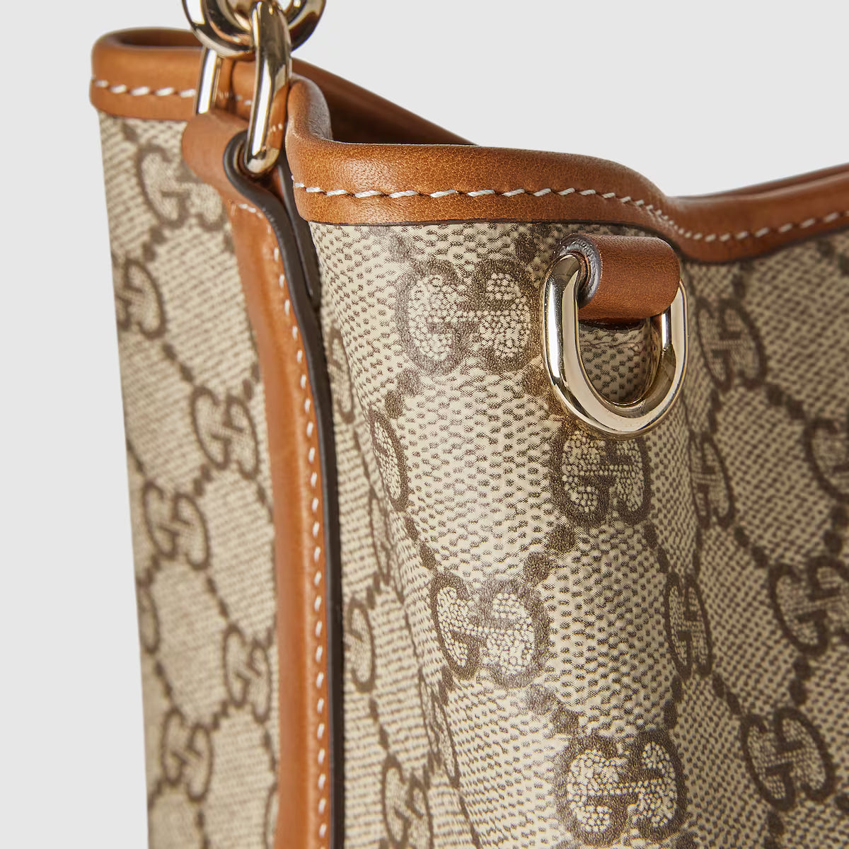 Gucci GG Emblem Bucket Bag — Monogram Coated Fabric