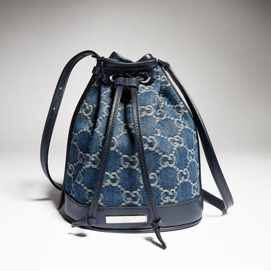 Mini bucket bag with Gucci plaque
